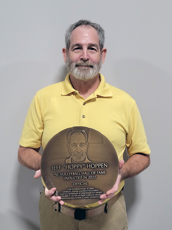 Photo of Jeffrey Hoppen with NCVBHOF plaque